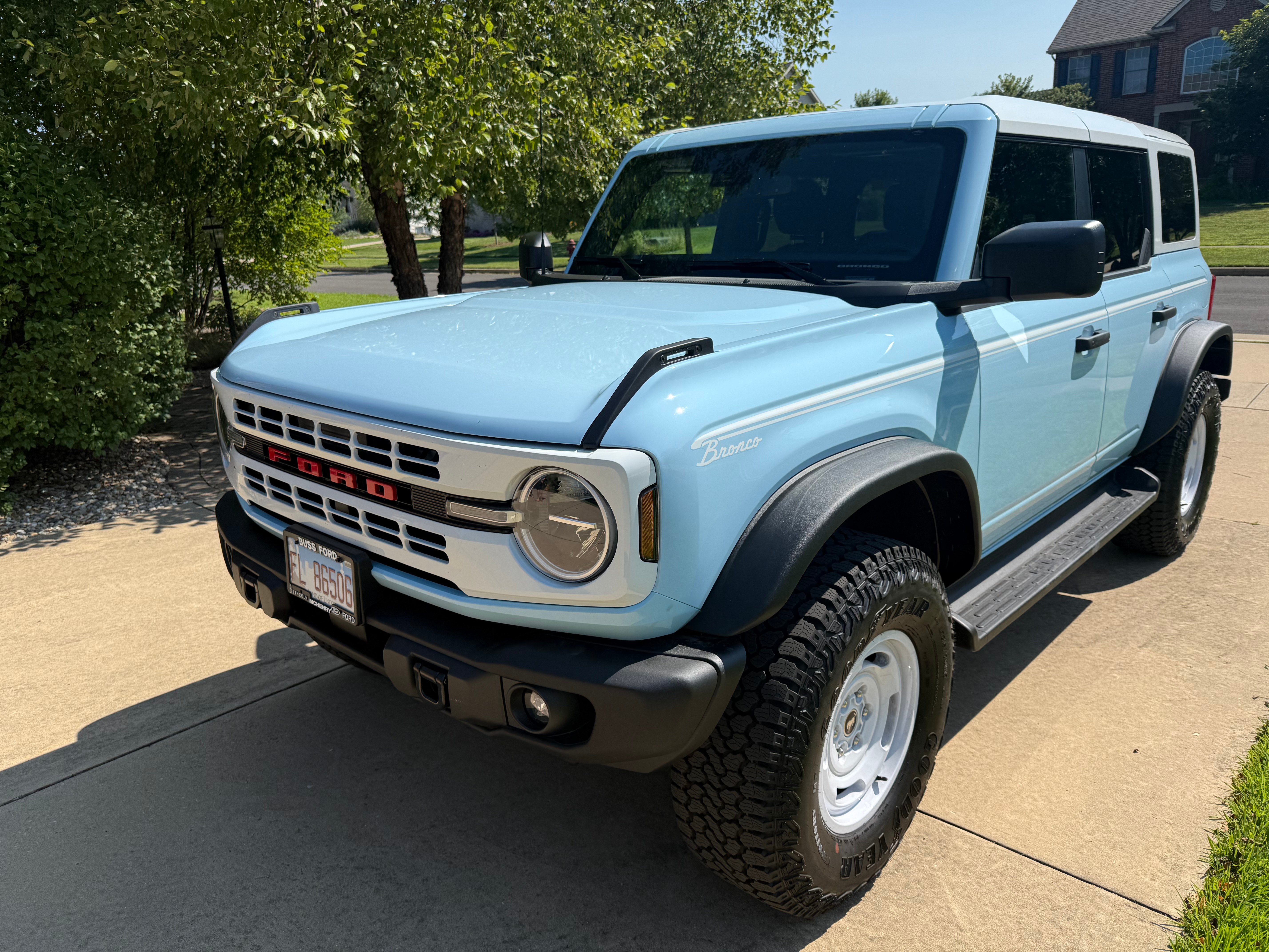 Ford Bronco front three-quarter view on driveway