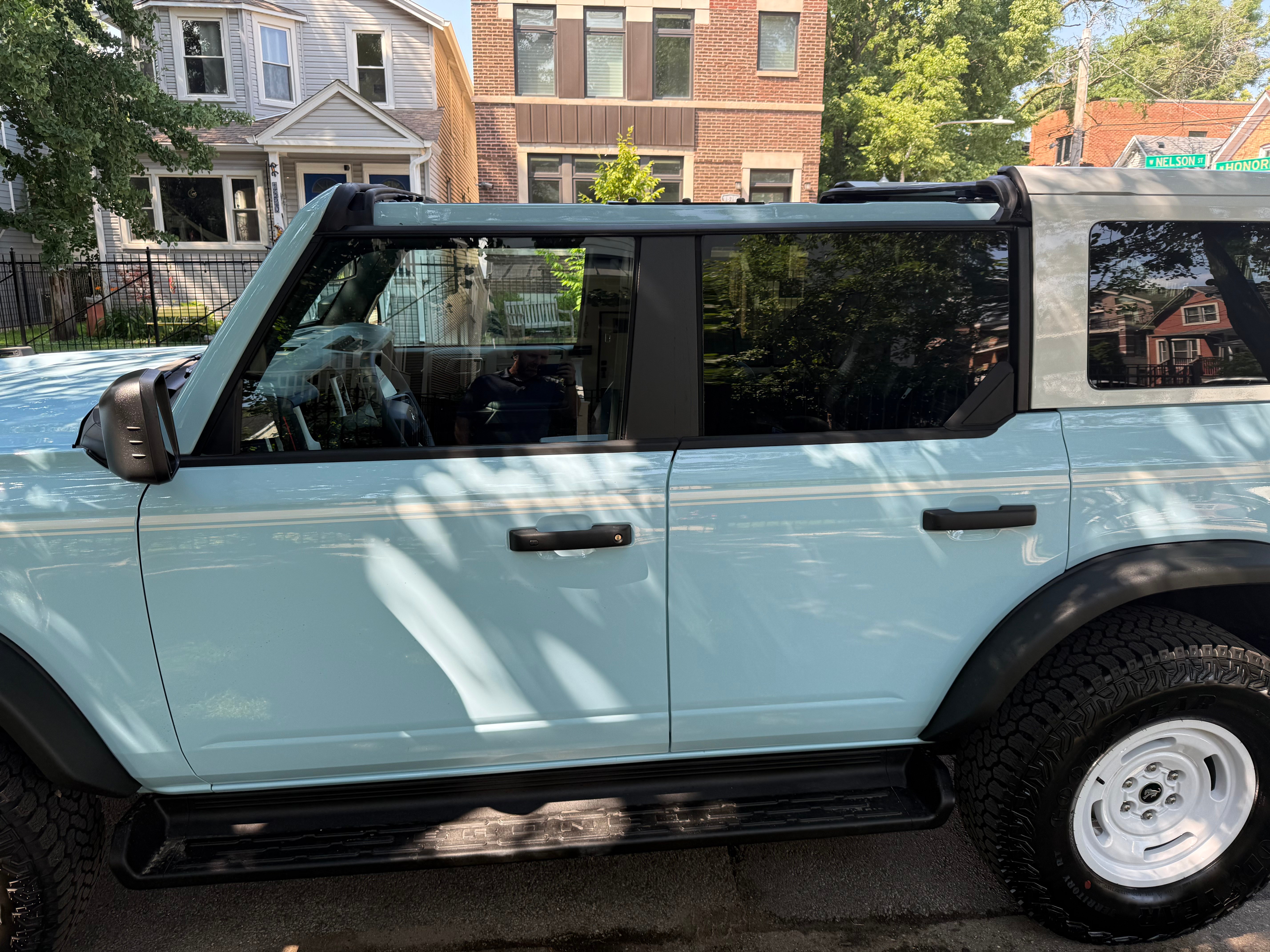 Close-up side profile showing door handles and windows